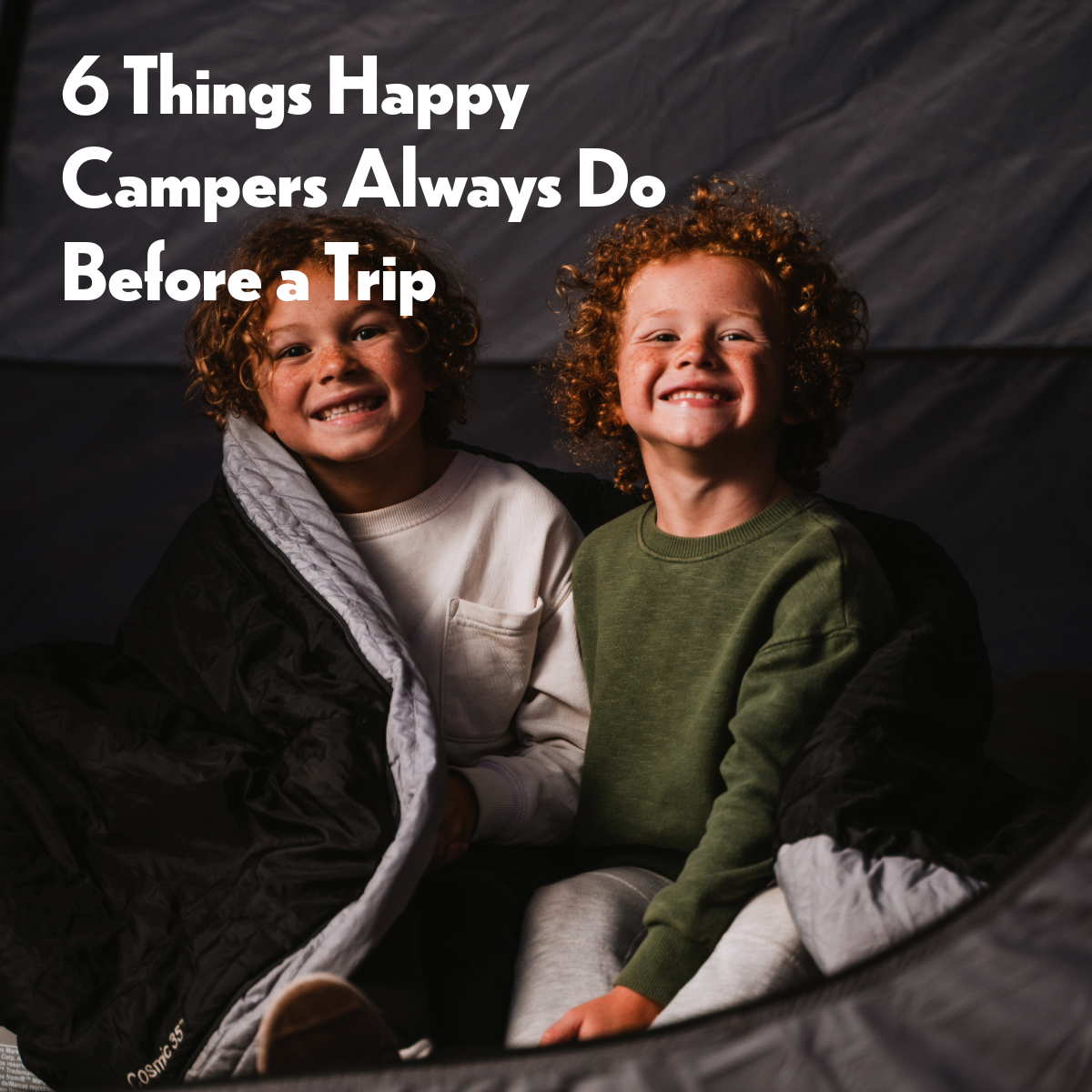 Happy campers in a tent