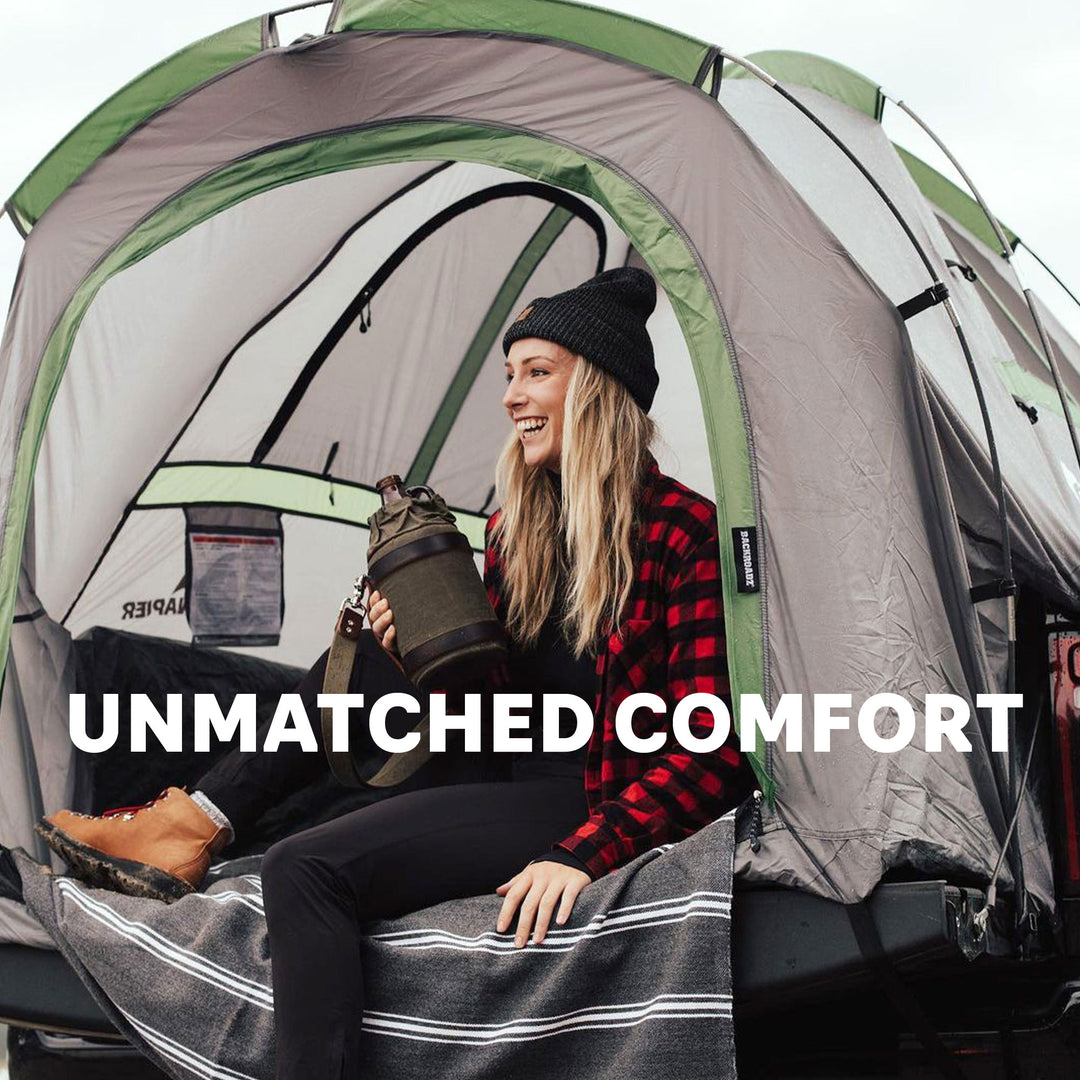 girl sitting inside a truck tent with unmatched comfort