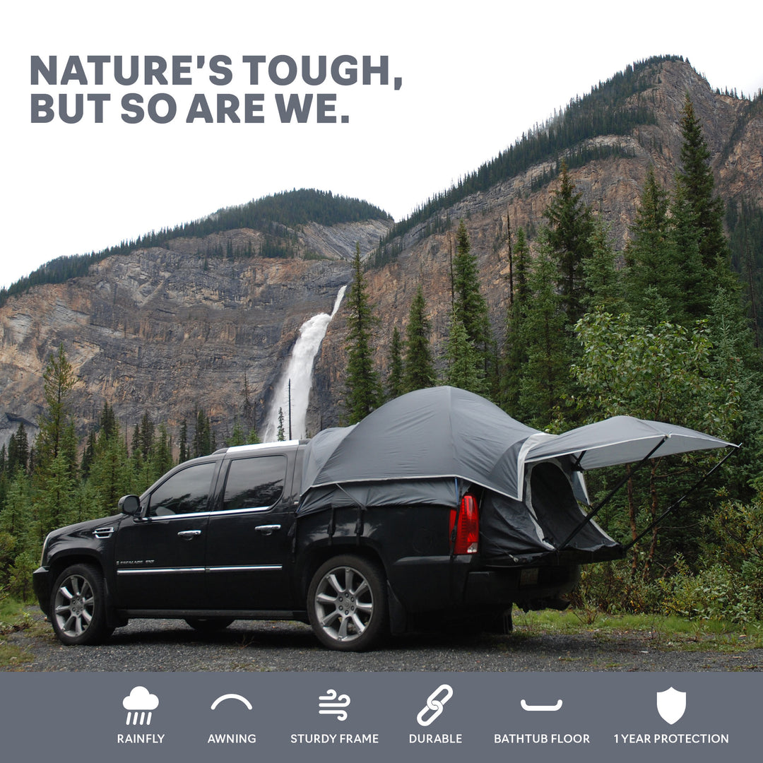 Napier Outdoors Chevrolet Avalanche Truck Tent Grey in front of mountains, titled "Nature's Tough, But So Are We"