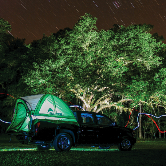 Napier outdoors backroadz green and grey truck tent under the stars