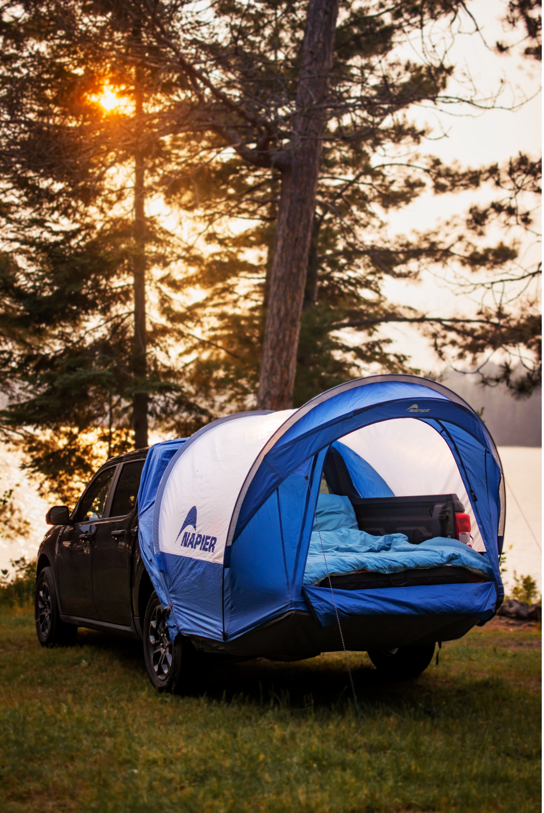 Napier ford maverick truck tent set up in the forest