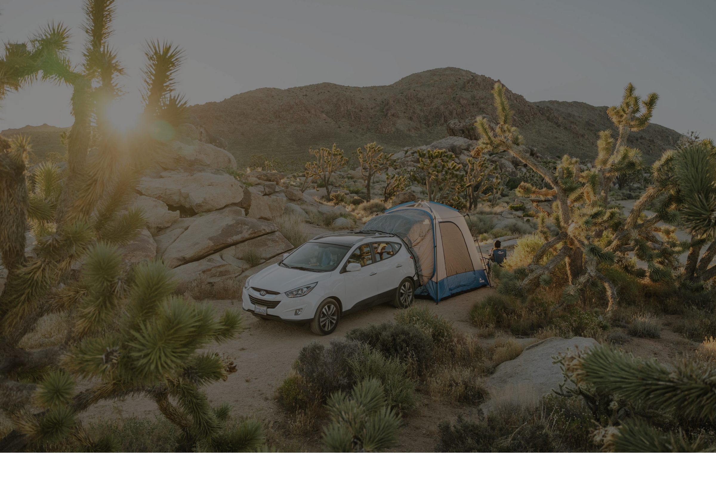 Napier SUV tent on a car in the desert overlanding camping