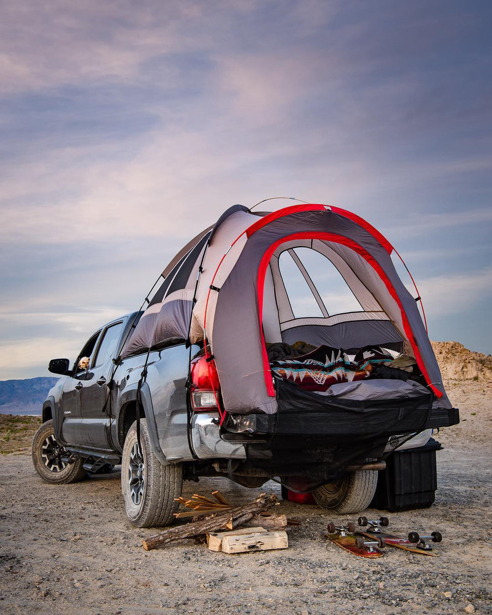 Red and grey truck tent on truck